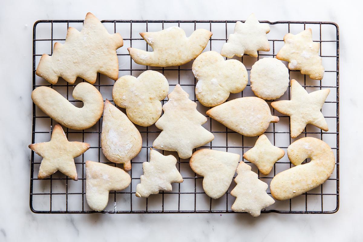 Sour Cream Sugar Cookies fresh from the oven on a baking rack.