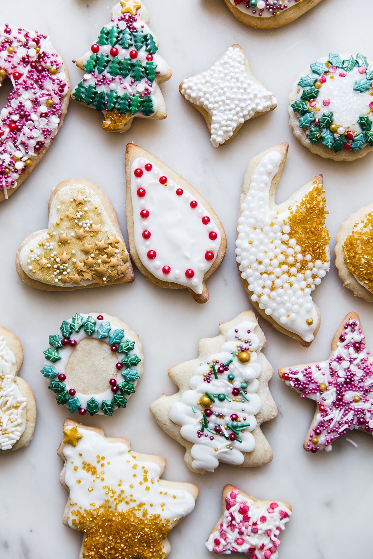 Sour Cream Sugar Cookies with Christmas sprinkles.