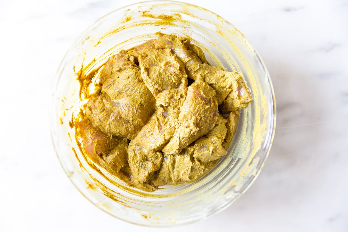 marinated chicken shawarma in a bowl