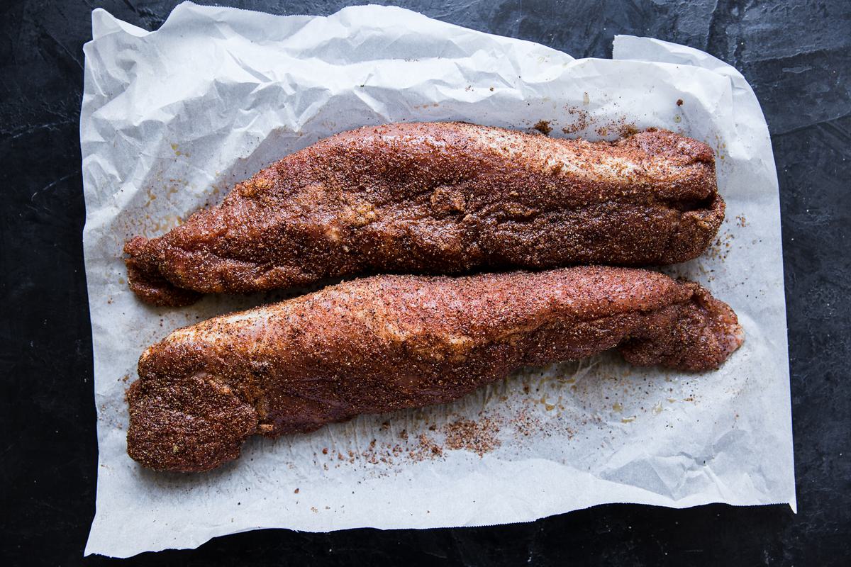 2 spice rubbed Pork Tenderloin on parchment