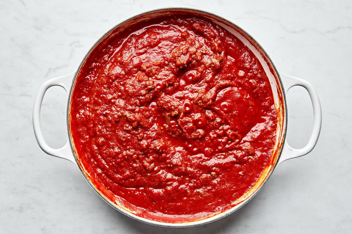 homemade meat sauce made with crushed tomatoes, ground beef, onion, garlic and spices